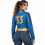 Women's cropped Vault 33 inspired blue leather jacket with gold trim and quilted shoulder panels